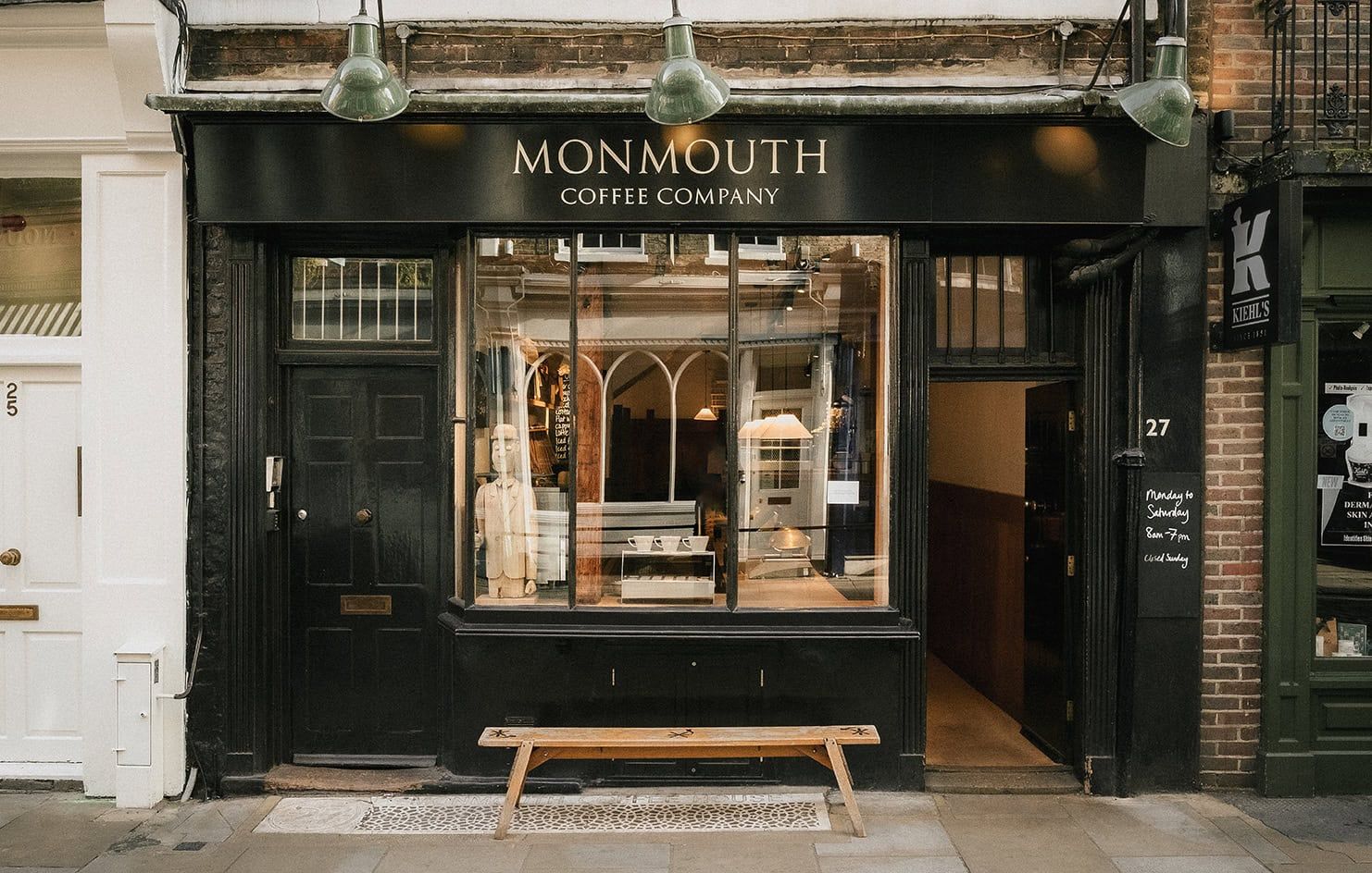 Monmouth Coffee Company's black-and-gold shopfront at 27 Monmouth Street, Covent Garden